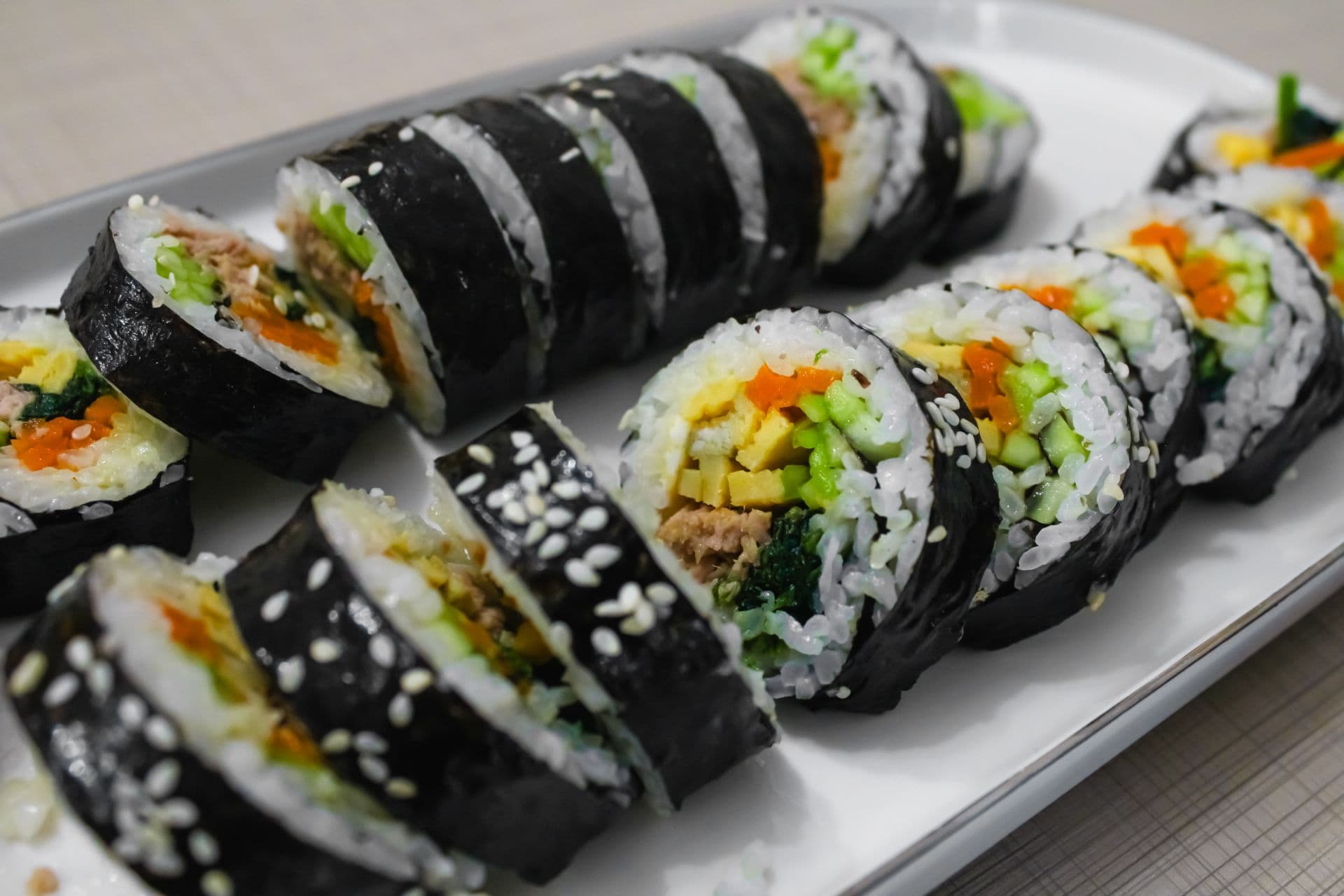 Sliced kimbap rolls — classic Korean kimbap recipe with beef, egg, spinach and danmuji
