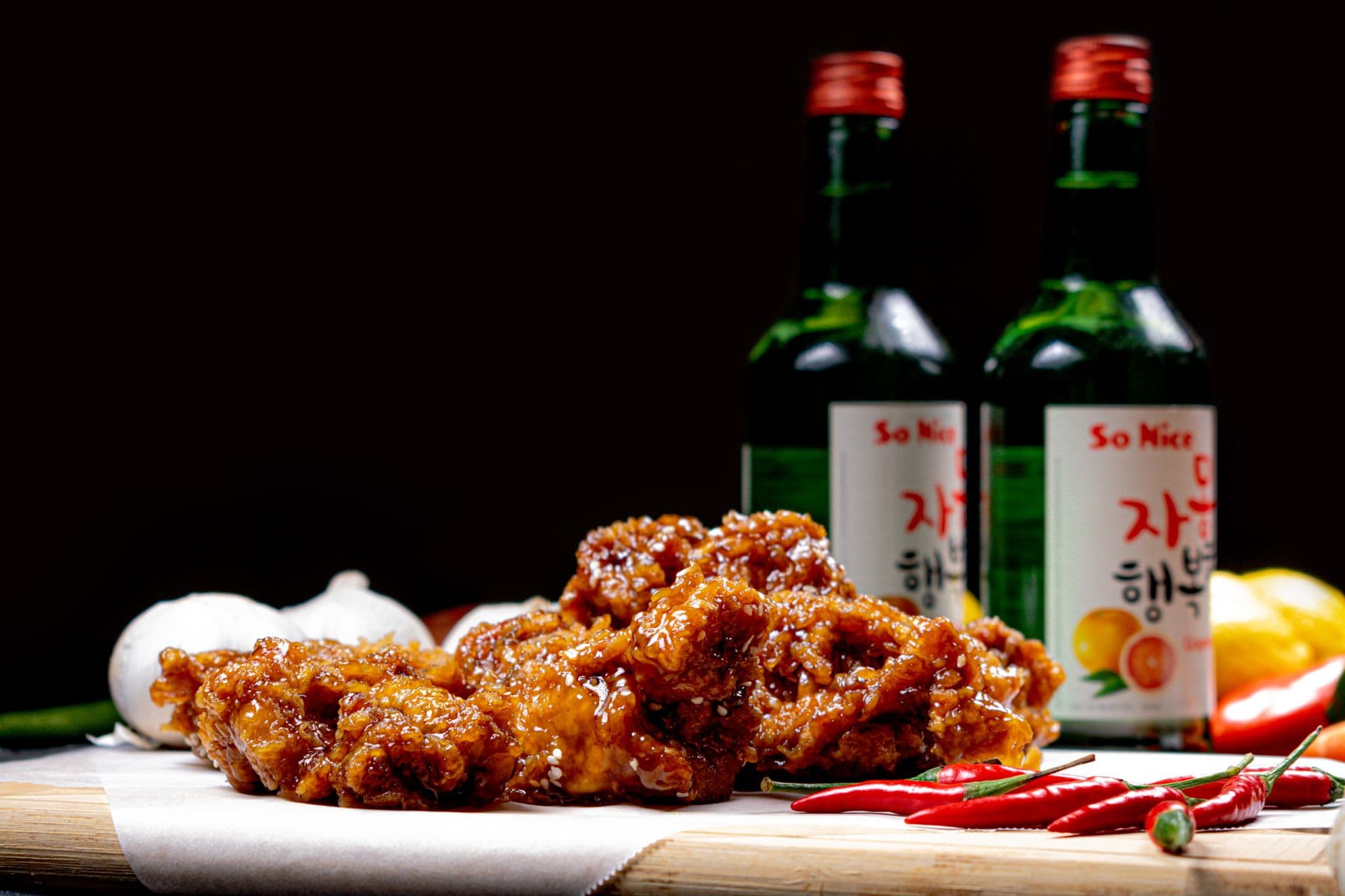 Crispy glazed Korean fried chicken recipe — yangnyeom wings with sesame seeds